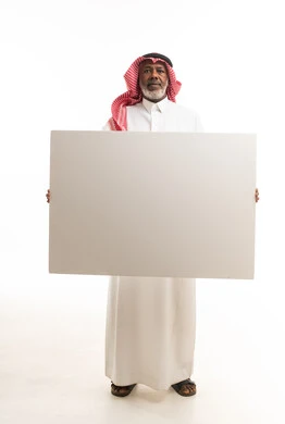Elderly Saudi Man Holding Blank White Board in Studio