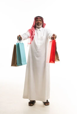 Elderly Saudi Man Holding Shopping Bags on White Background