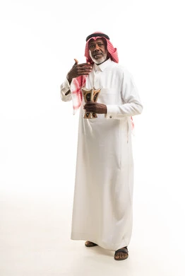 Elderly Saudi Man Holding Traditional Incense Burner