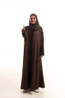 African Woman in Brown Abaya Thumbs Up White Background