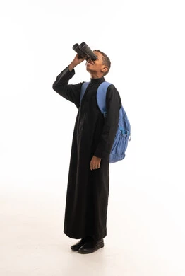 Saudi Boy with Binoculars and Blue School Backpack