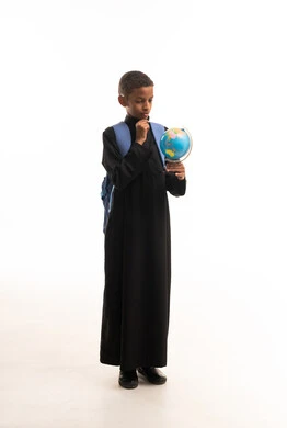 Sudanese Student in Black Thobe Holding Globe