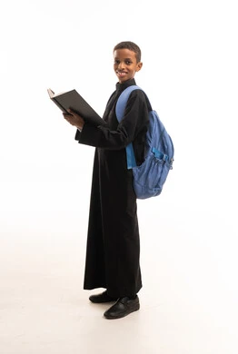 African Schoolboy in Black Thobe with Backpack