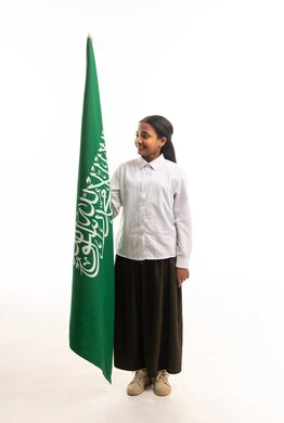 Saudi Schoolgirl Holding National Flag on White Background