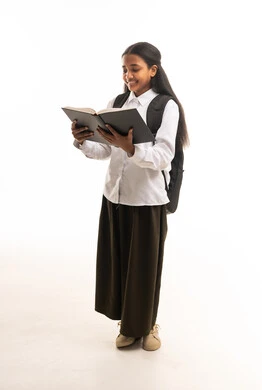 Saudi Schoolgirl Reading Book in Studio Portrait