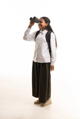 Saudi Schoolgirl with Binoculars on White Background