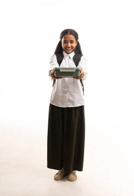 Saudi Schoolgirl in Uniform Holding Green Lunch Box