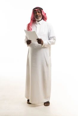 Elderly Saudi Man in Traditional Thobe Holding Documents