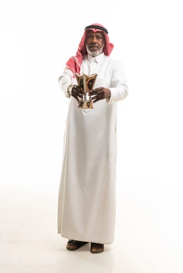 Elderly Saudi Man Holding Traditional Incense Burner