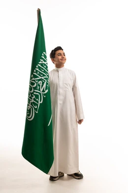 Saudi Boy in Thobe with National Flag