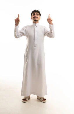 Young Saudi Man in White Thobe Pointing Upward Studio