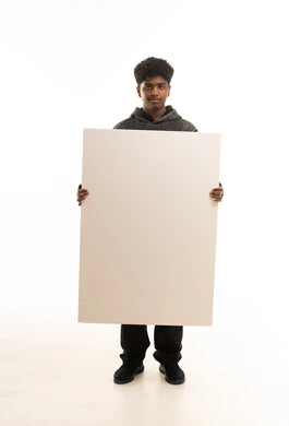 Saudi Man Holding Blank Vertical Poster on White Background