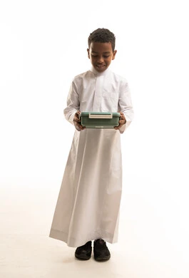 Saudi Boy Holding Green Lunch Box on White Background
