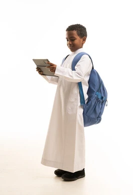Saudi Boy with Tablet and School Backpack
