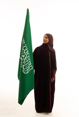 Saudi Woman Holding National Flag on White Background