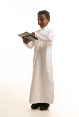 Saudi Boy Using Digital Tablet on White Background