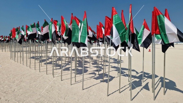 United Arab Emirates National Flags on Sandy Beach