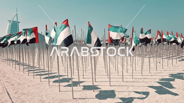 UAE Flags on Dubai Jumeirah Beach with Burj Al Arab