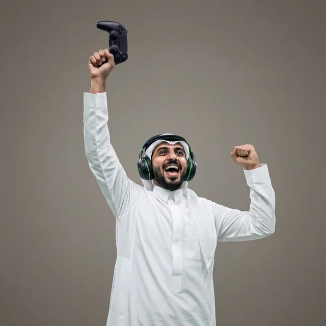 Saudi Man in Traditional Dress Celebrating Video Game Win