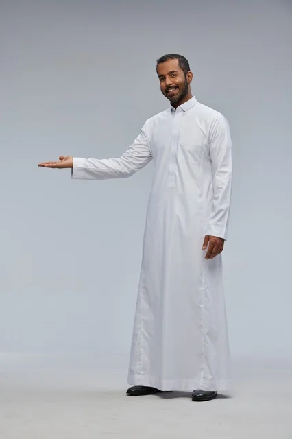 Saudi Man in White Thobe Presenting Gesture Studio Shot