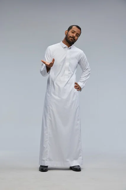Saudi Man in White Thobe Studio Portrait Gesture