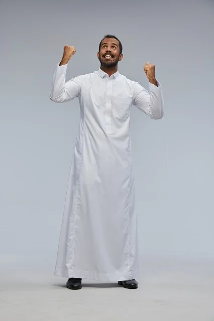 Saudi Man in White Thobe Celebrating Success
