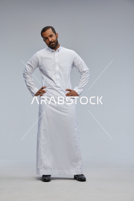 Saudi Man in White Thobe Posing in Studio