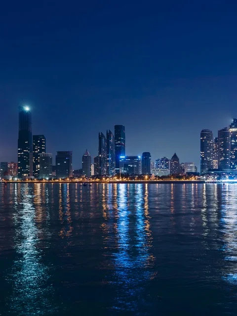 Doha Qatar Skyline Night View with Water Reflection