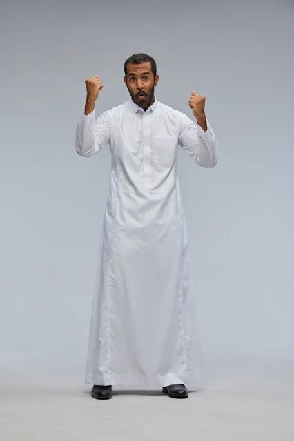 Saudi Man in White Thobe Celebrating Success