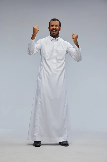 Saudi Man in White Thobe Celebrating Success