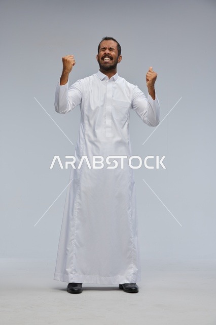 Saudi Man Celebrating Victory in White Thobe