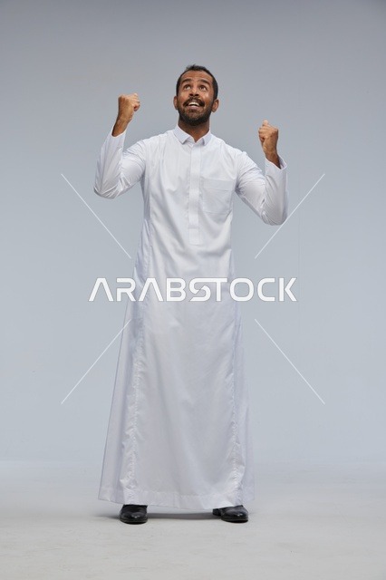 Saudi Man in White Thobe Celebrating Success