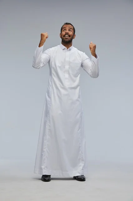 Saudi Man in White Thobe Celebrating Success