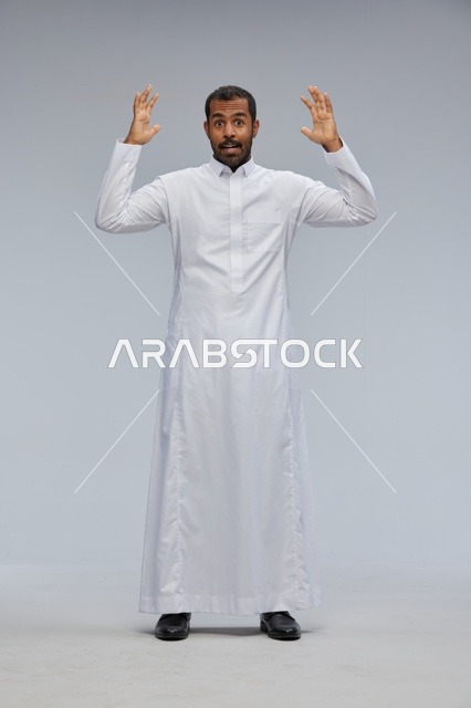 Saudi Man in White Thobe with Surprised Studio Expression