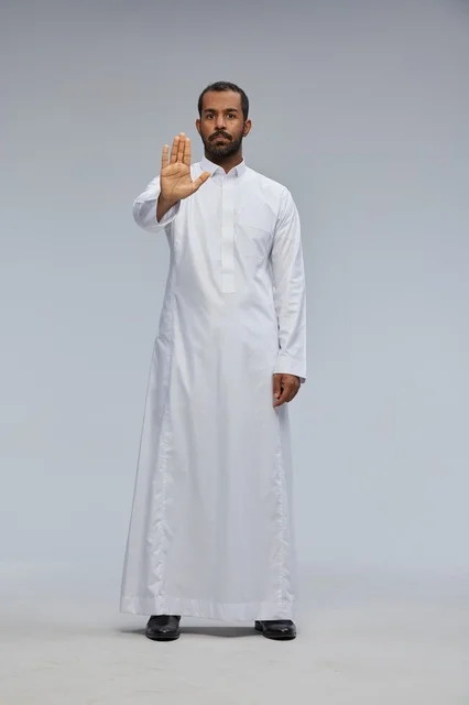 Saudi Arabian Man in White Thobe Making Stop Gesture Studio