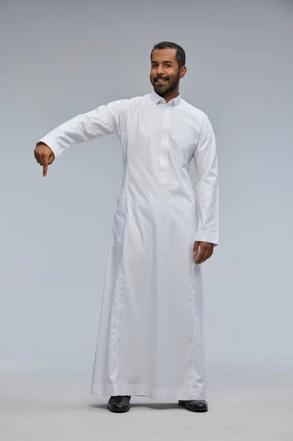 Saudi Man in White Thobe Pointing Downwards Studio