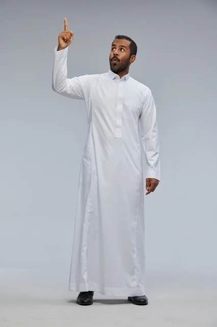Saudi Man in White Thobe Pointing Up in Surprise