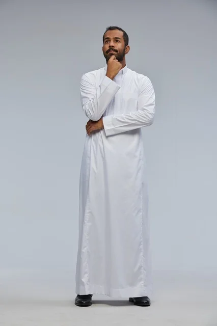 Saudi Man in White Thobe Thinking Pose Studio