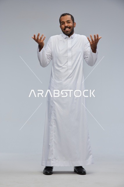 Saudi Man in White Thobe Gesturing in Full Length Studio