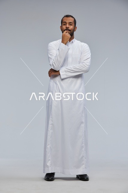 Saudi Man in White Thobe Studio Thinking Pose Portrait