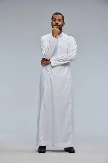 Saudi Man in White Thobe Studio Thinking Pose Portrait
