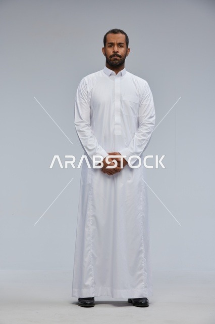 Saudi Man in Traditional White Thobe Studio Portrait