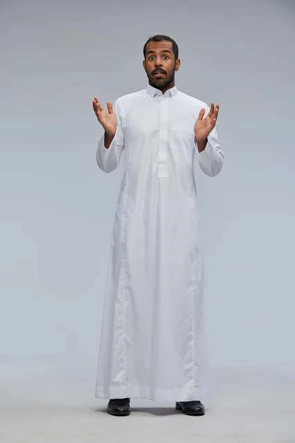 Saudi Man in White Thobe with Surprised Expression