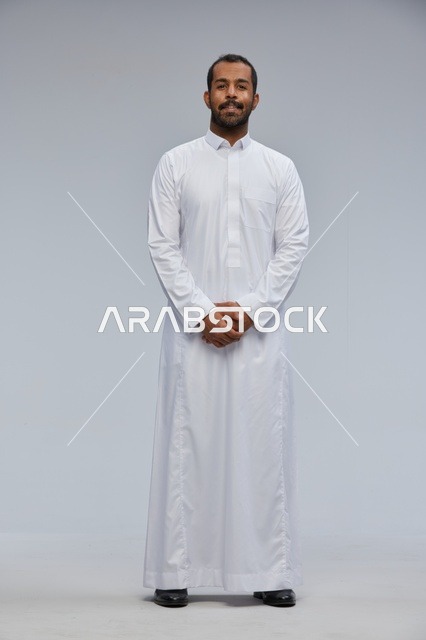 Saudi Man in Traditional White Thobe Studio Portrait