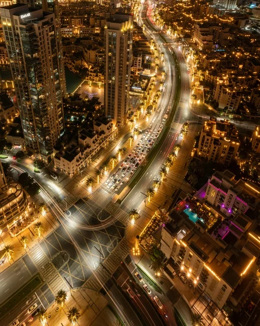 Aerial View of Dubai Night Cityscape and Traffic