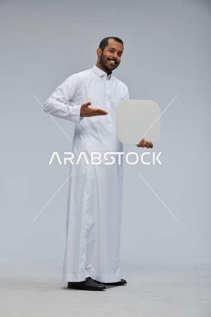 Saudi Man in White Thobe Holding Blank Sign Board