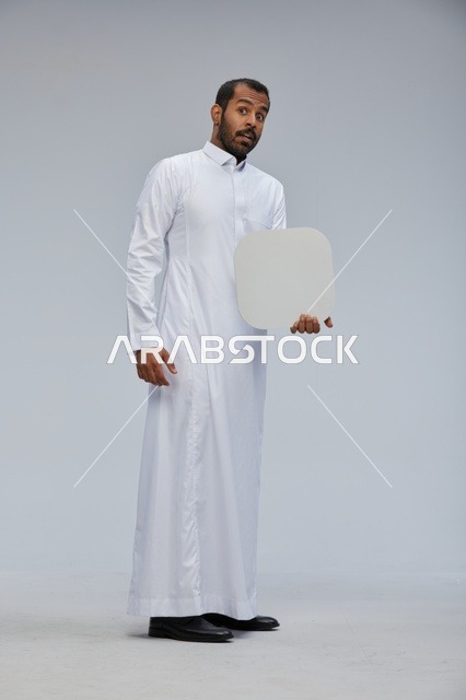 Saudi Man in White Thobe Holding Blank White Sign Board