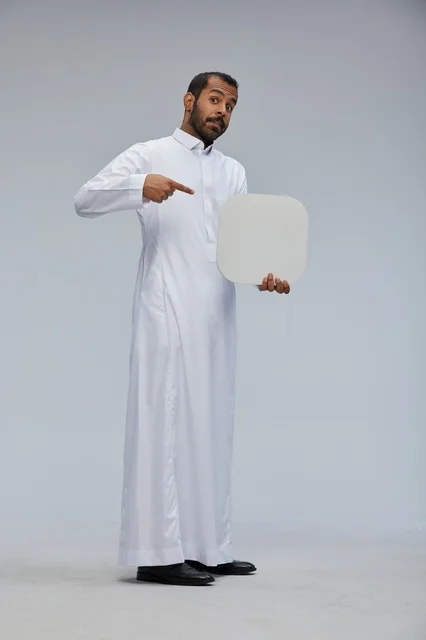 Saudi Man in Thobe Holding Blank White Board