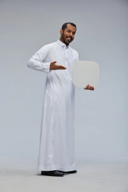 Saudi Man Holding Blank White Board in Studio