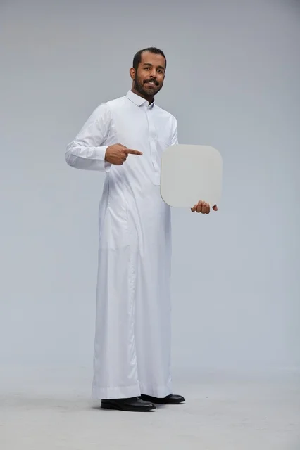 Saudi Man in Thobe Holding Blank White Board